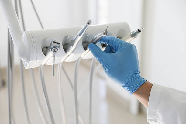 Professional Emergency Dentist technician working in Morrice, MI